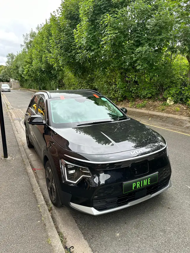 Black Kia Niro on a Finchley street with its replacement windscreen fitted