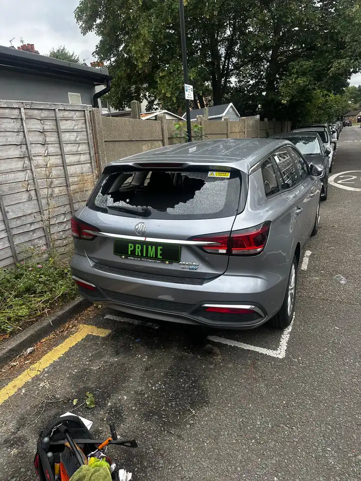 Before: grey MG5 estate with a smashed heated rear window