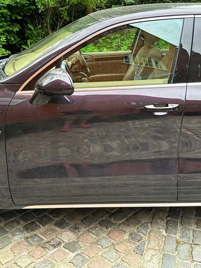 After: the same Porsche Cayenne with its new front passenger window fitted