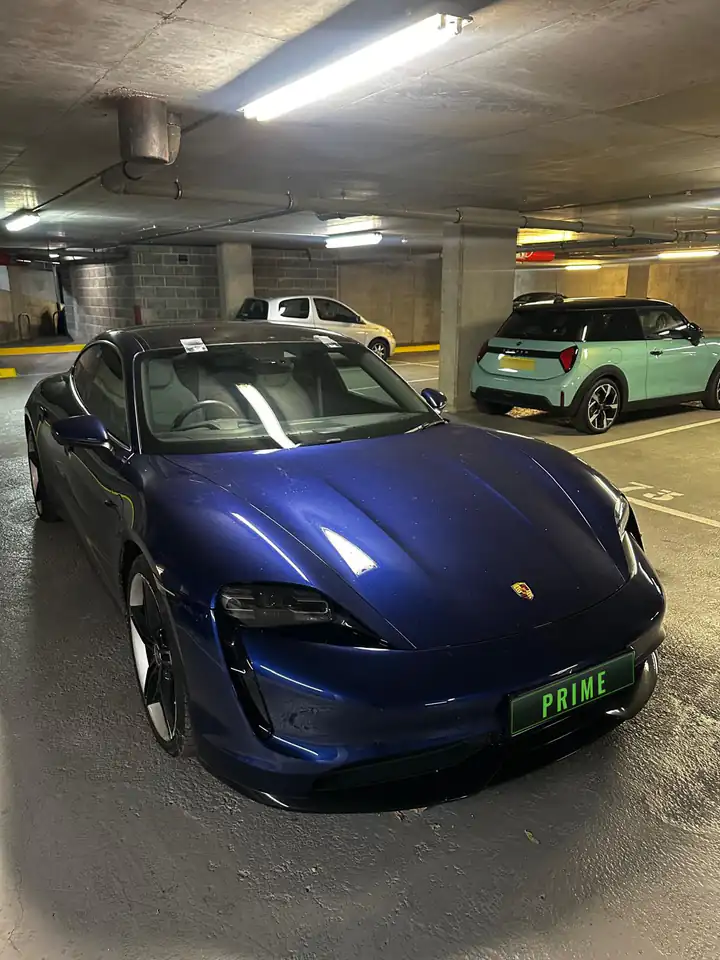 After: the same Porsche Taycan with its replacement windscreen fitted