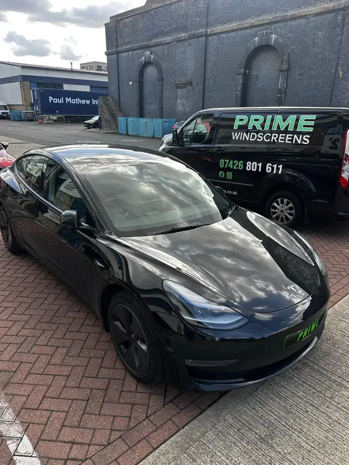 After: the same Tesla Model 3 with a new windscreen fitted